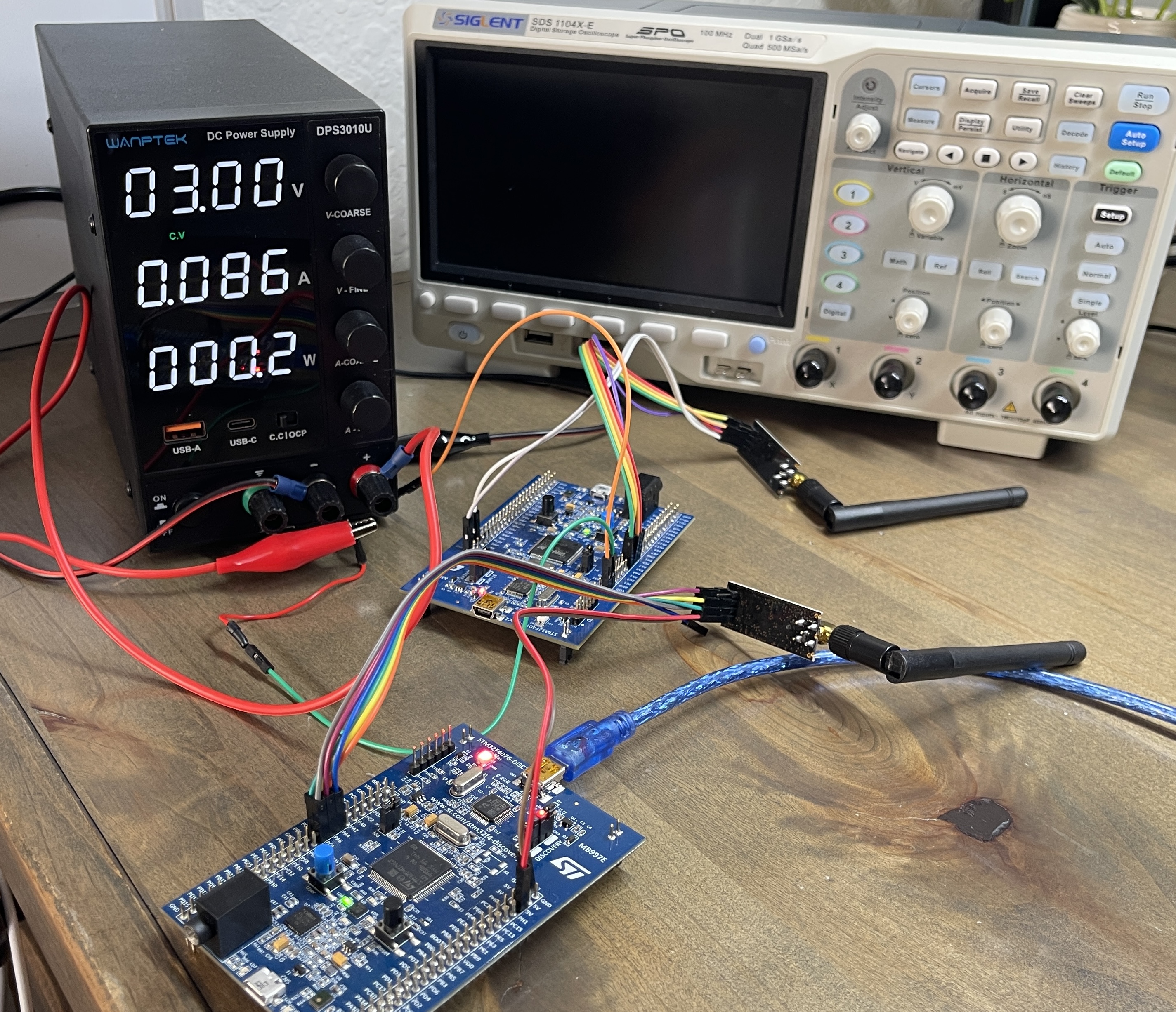 Two STM32F407-Disc1 boards that are communicating with each other over radio modules