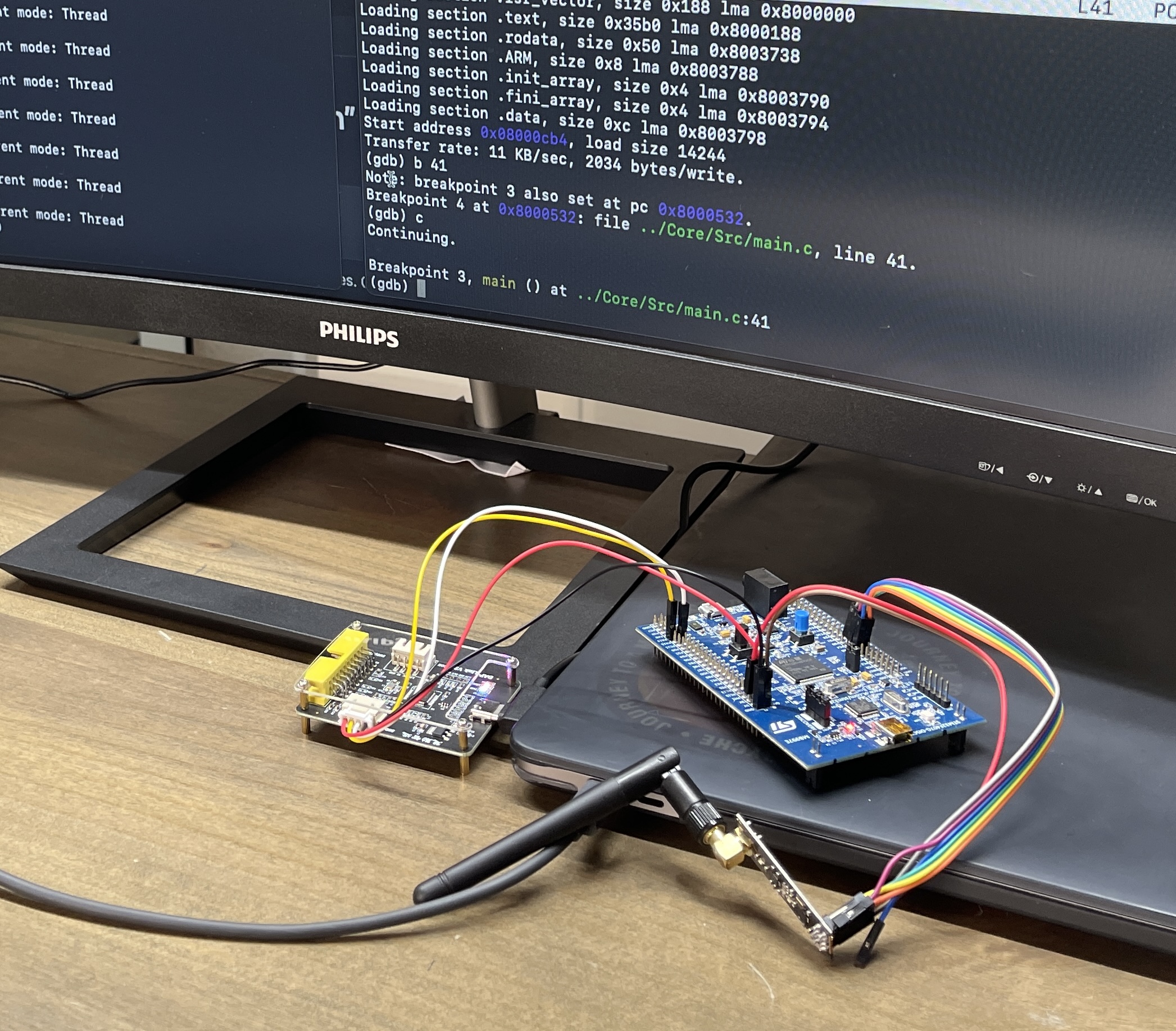 External debugger connected to one of the boards via the SWD ports